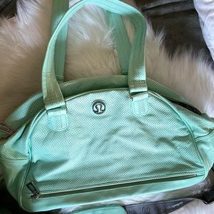 Lululemon Retrogroove Duffel Bag aqua color